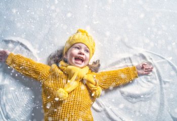 Featured-Image-kid-making-snow-angel-new-year